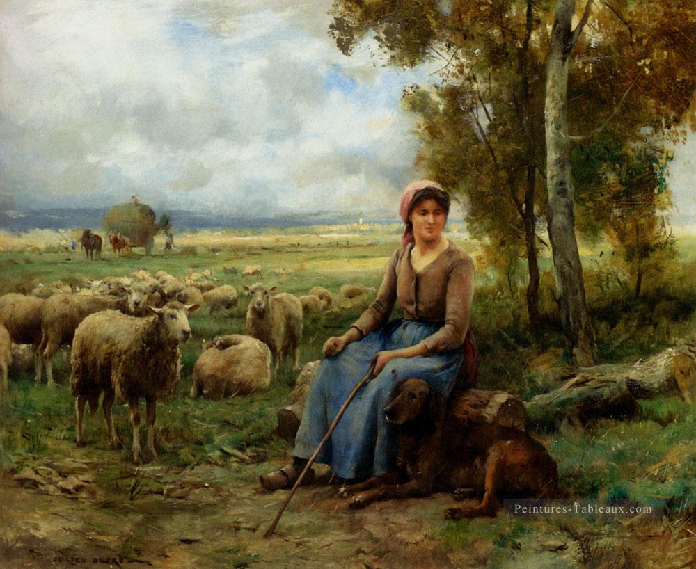 La bergère surveille son troupeau Vie rurale réalisme Julien Dupré Peintures à l'huile